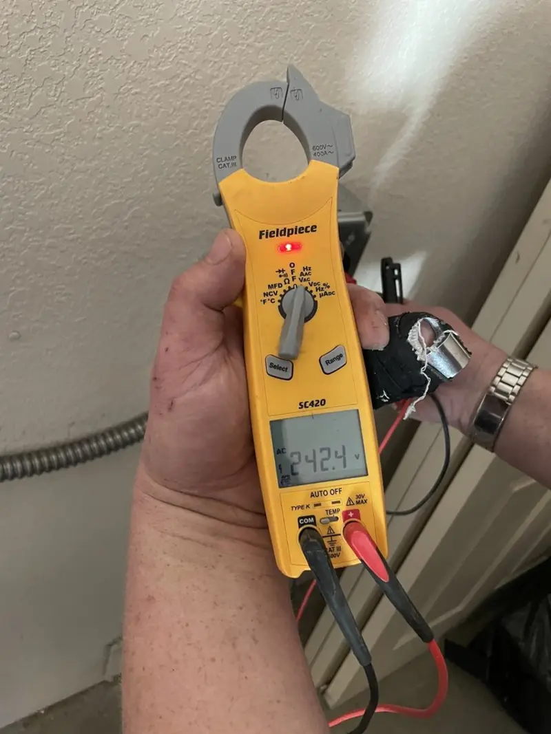 Voltage testing with clamp meter during Outlet Installation in Lathrop